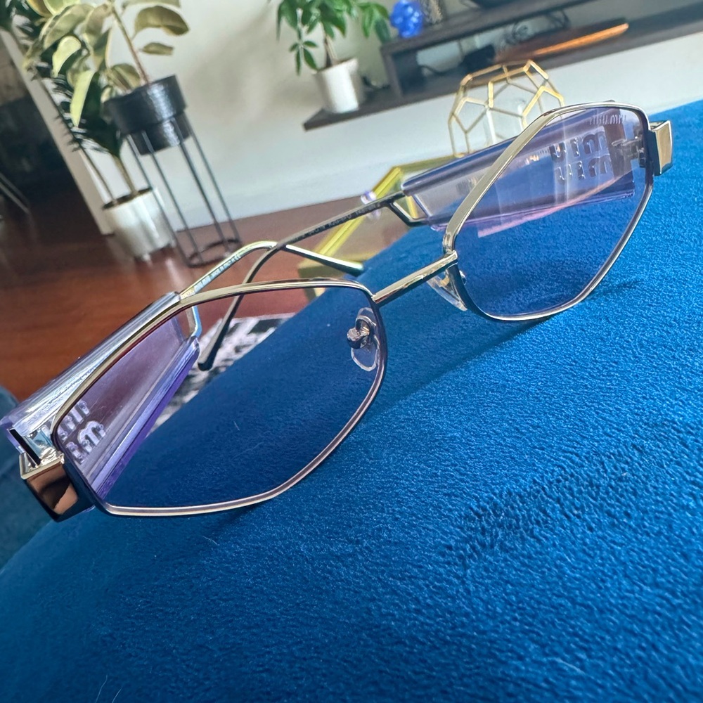 Miu Miu violet lens glasses